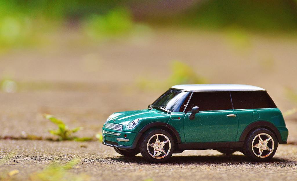 A photo of a little toy car.