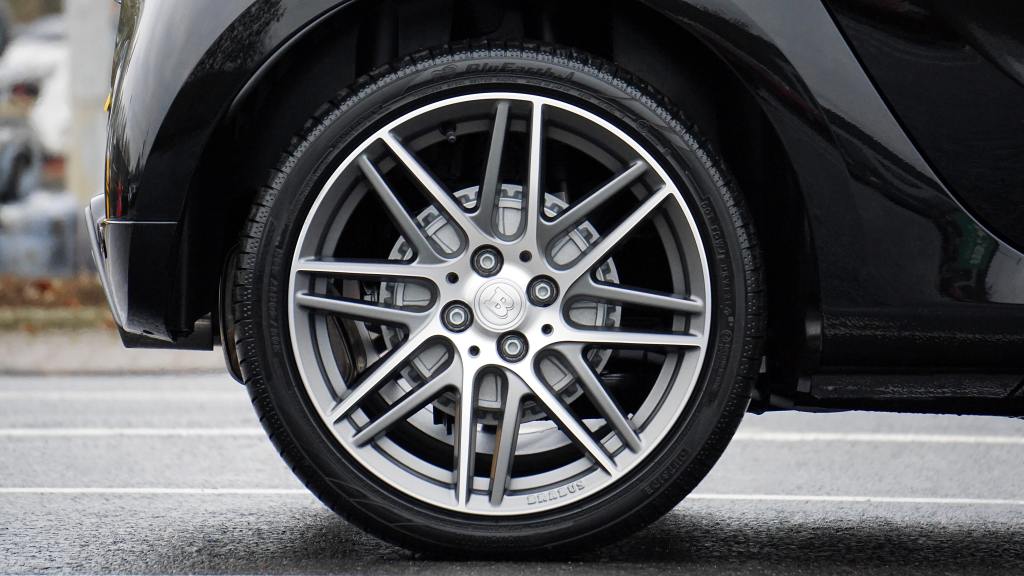 A photo of a car's tire.